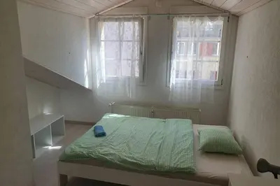 Ein Bett oder Betten in einem Zimmer der Unterkunft Classy Apartment