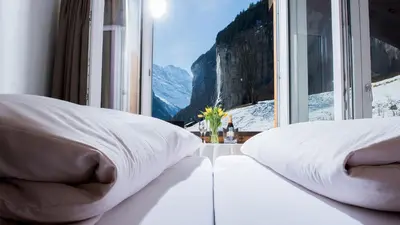 Ein Bett oder Betten in einem Zimmer der Unterkunft Hotel Silberhorn