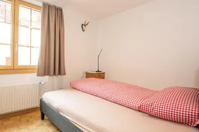 Ein Bett oder Betten in einem Zimmer der Unterkunft Am Strubelweg