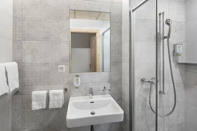 Ein Badezimmer in der Unterkunft Eiger Guesthouse