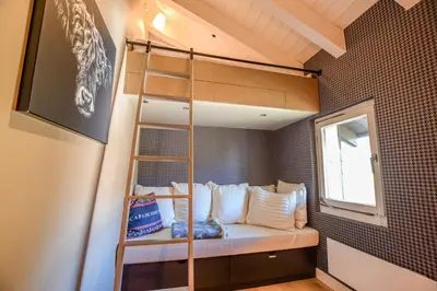 Ein Bett oder Betten in einem Zimmer der Unterkunft Mitenand Attika