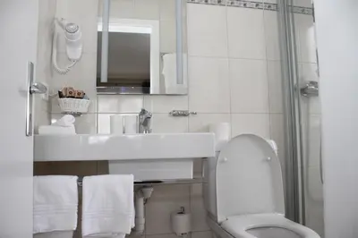 Ein Badezimmer in der Unterkunft Grichting Hotel & Serviced Apartments