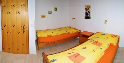 Ein Bett oder Betten in einem Zimmer der Unterkunft Haus Arolle, Bettmeralp