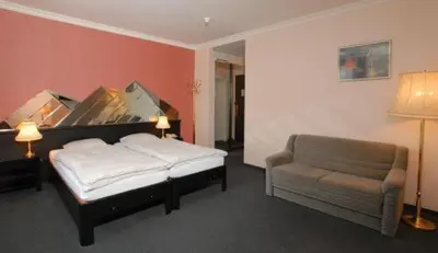 Ein Bett oder Betten in einem Zimmer der Unterkunft Mattenhof Resort