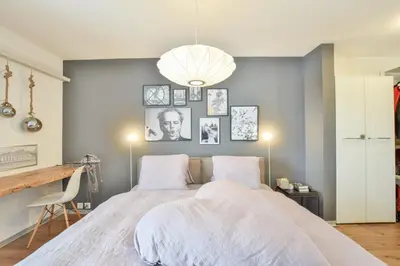 Ein Bett oder Betten in einem Zimmer der Unterkunft Valaisia 124