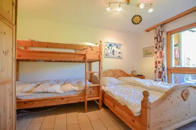 Ein Bett oder Betten in einem Zimmer der Unterkunft Weisshorn 24