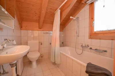 Ein Badezimmer in der Unterkunft Chalet Collini