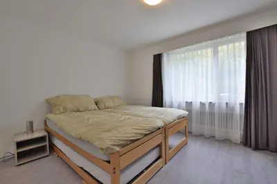 Ein Bett oder Betten in einem Zimmer der Unterkunft Rhodania 66