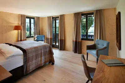 Ein Bett oder Betten in einem Zimmer der Unterkunft Eiger View Alpine Lodge