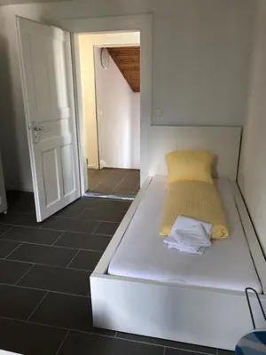 Ein Bett oder Betten in einem Zimmer der Unterkunft Villa Matten