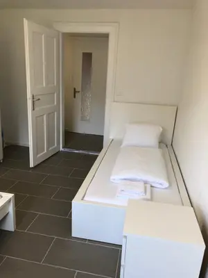 Ein Bett oder Betten in einem Zimmer der Unterkunft Villa Matten