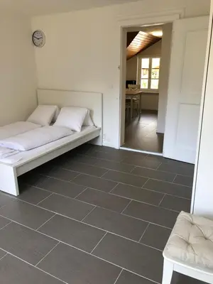 Ein Bett oder Betten in einem Zimmer der Unterkunft Villa Matten