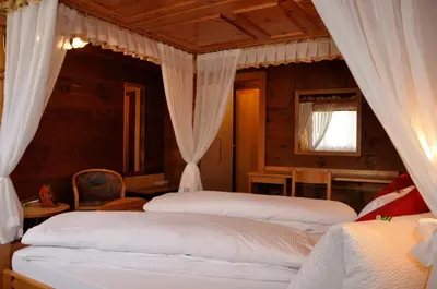Ein Bett oder Betten in einem Zimmer der Unterkunft Hotel Tenne