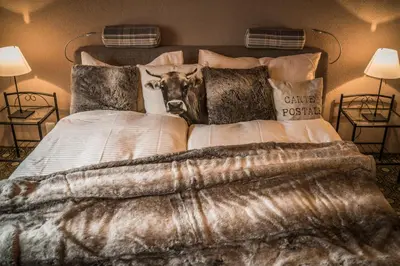 Ein Bett oder Betten in einem Zimmer der Unterkunft Hotel-Restaurant Burgseeli