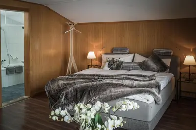 Ein Bett oder Betten in einem Zimmer der Unterkunft Hotel-Restaurant Burgseeli