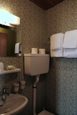 Ein Badezimmer in der Unterkunft Hotel Tourist