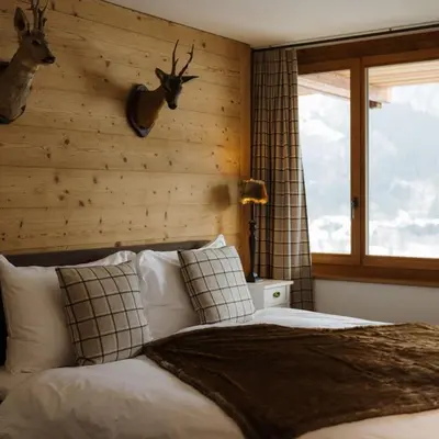 Ein Bett oder Betten in einem Zimmer der Unterkunft Bergwelt Grindelwald Residence
