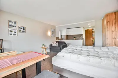 Ein Bett oder Betten in einem Zimmer der Unterkunft Rhodania 52