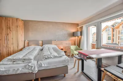 Ein Bett oder Betten in einem Zimmer der Unterkunft Rhodania 52