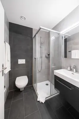 Ein Badezimmer in der Unterkunft Studio JACKIE Interlaken