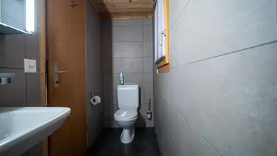 Ein Badezimmer in der Unterkunft Izba
