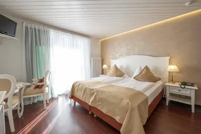 Ein Bett oder Betten in einem Zimmer der Unterkunft Seilers Vintage Hotel & Spa