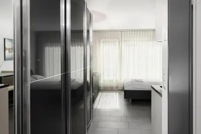Ein Bett oder Betten in einem Zimmer der Unterkunft Studio PAOLA Interlaken