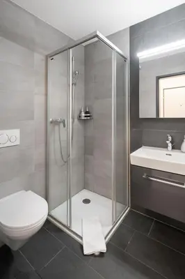 Ein Badezimmer in der Unterkunft Studio VICTORIA Interlaken