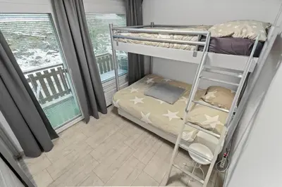 Ein Bett oder Betten in einem Zimmer der Unterkunft Appartement cosy au centre de la station