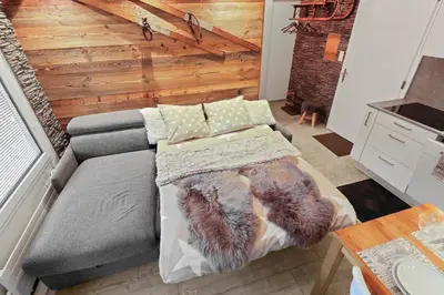 Ein Sitzbereich in der Unterkunft Appartement cosy au centre de la station