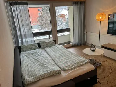 Ein Bett oder Betten in einem Zimmer der Unterkunft Super central - appartement 2,5pcs à Leukerbad