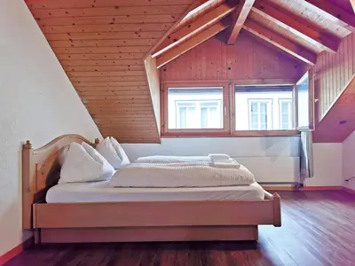 Ein Bett oder Betten in einem Zimmer der Unterkunft Interlaken apartment 27