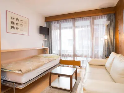 Ein Bett oder Betten in einem Zimmer der Unterkunft Studio Velan 115 by Interhome