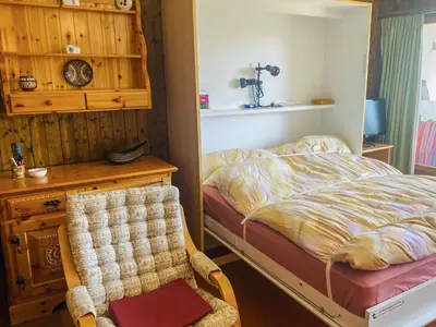 Ein Bett oder Betten in einem Zimmer der Unterkunft Studio Hameau A04 by Interhome