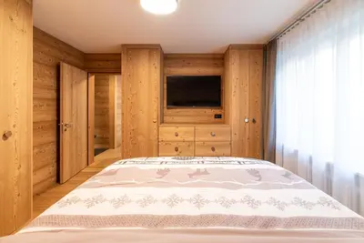 Ein Bett oder Betten in einem Zimmer der Unterkunft Haus Mirador by Zermatt Premium Apartments