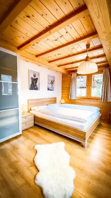 Ein Bett oder Betten in einem Zimmer der Unterkunft Bergquelle 1.OG Ost
