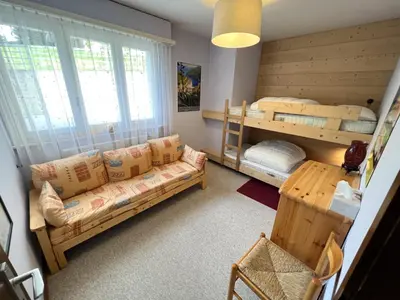 Ein Bett oder Betten in einem Zimmer der Unterkunft Bel appartement 3 pièces au pied des pistes de ski