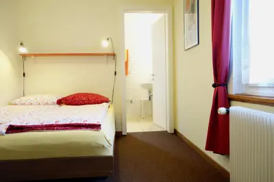 Ein Bett oder Betten in einem Zimmer der Unterkunft ARNOLDS Bed & Breakfast