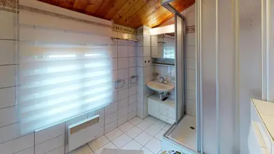 Ein Badezimmer in der Unterkunft Chalet Leonie LE0