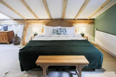 Ein Bett oder Betten in einem Zimmer der Unterkunft Chalet Antoine serviced Apartments by Mirabeau