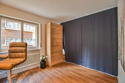 Ein Sitzbereich in der Unterkunft Valaisia 125