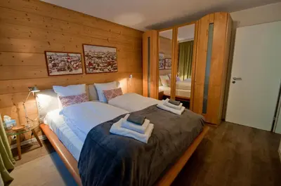 Ein Bett oder Betten in einem Zimmer der Unterkunft Haus Bodmen C, Apartment Edelweiss