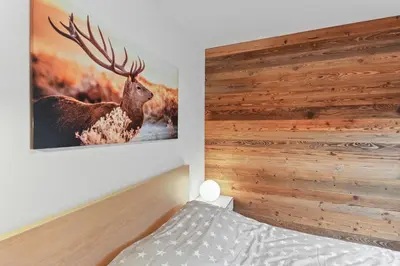 Ein Bett oder Betten in einem Zimmer der Unterkunft Appartement en plein centre de Crans Montana
