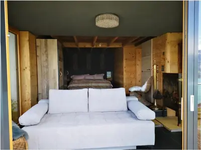 Ein Bett oder Betten in einem Zimmer der Unterkunft Chalet with panoramic views of the mountains of the Oberland and Lake Thun