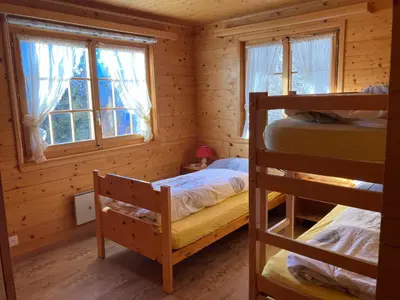 Ein Bett oder Betten in einem Zimmer der Unterkunft Chalet Valeria