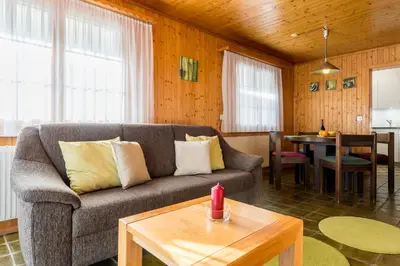 Ein Sitzbereich in der Unterkunft Chalet Sunnegga