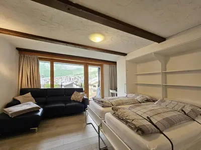Ein Bett oder Betten in einem Zimmer der Unterkunft Alpengarten 1. OG