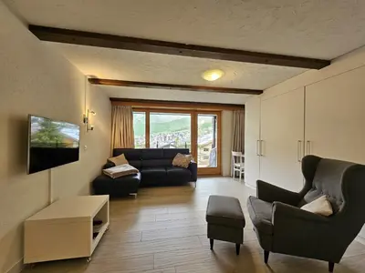 Ein Sitzbereich in der Unterkunft Alpengarten 1. OG