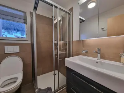 Ein Badezimmer in der Unterkunft Luxury Apartment Romaine 1st floor