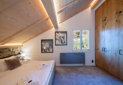 Ein Bett oder Betten in einem Zimmer der Unterkunft Chalet Margaux Penthouse